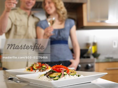 Couple Toasting at Dinner