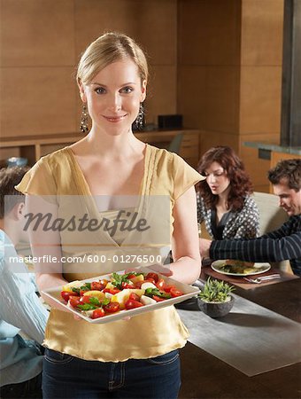 Portrait of Woman Hosting Dinner Party