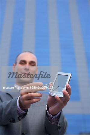Businessman using a palmtop