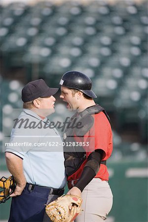 Catcher arguing with Umpire
