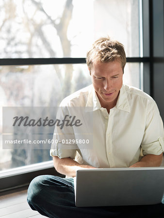 Man Using Laptop Computer