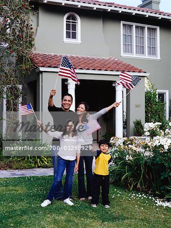 Family Waving American Flags
