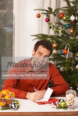 Man Writing Christmas Cards