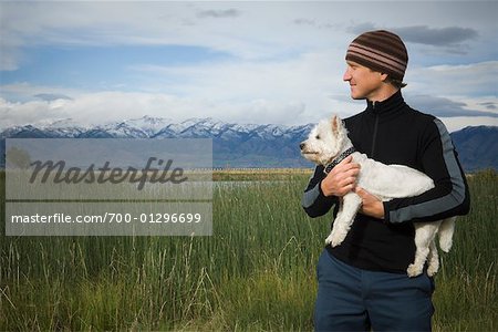 Man Holding Dog