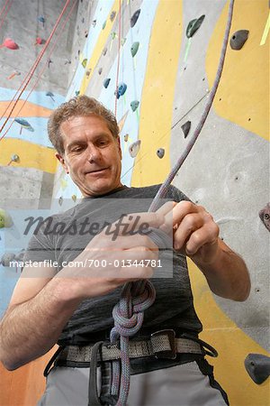 Man in Climbing Gym