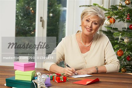 Woman Writing Christmas Card