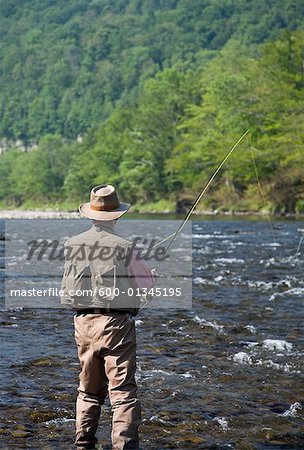 Man Fly Fishing, Beaverkill River, Catskill Park, New York, USA