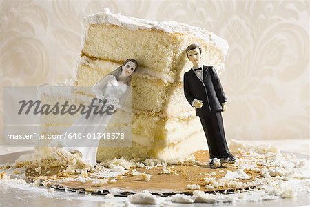 Wedding cake visual metaphor with figurine cake toppers