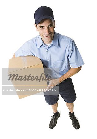 High angle view of a mailman holding a package