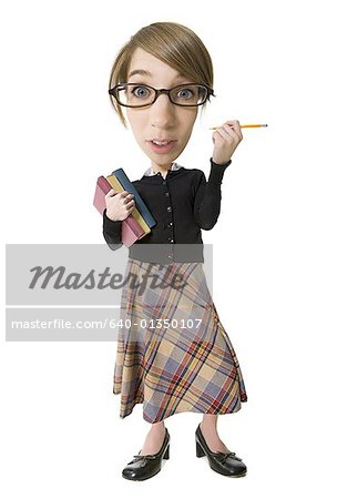 Jeune femme portant des lunettes et la tenue de livres