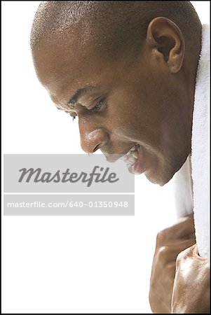 Profile of a young man sitting after a work out