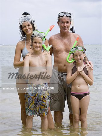 Portrait of a family wearing scuba masks and snorkels