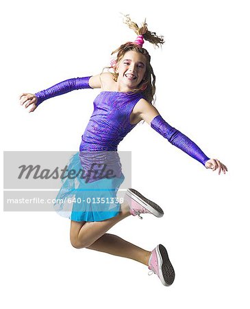 Girl in costume leaping