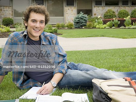 Male student studying outdoors