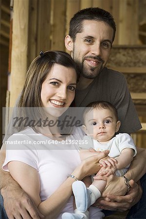 Portrait of a young couple with their son