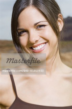 Close-up of a young woman smiling