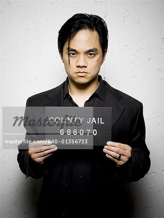 Mug shot of man with cut