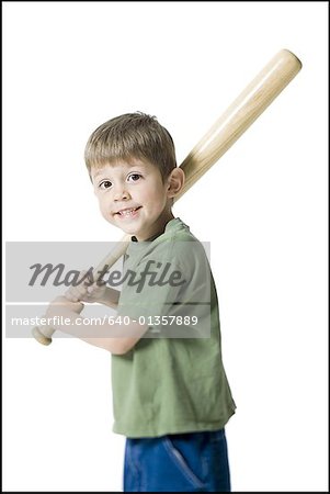 Portrait of a boy holding a baseball bat