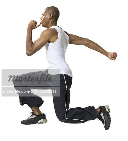 Portrait of a young man running