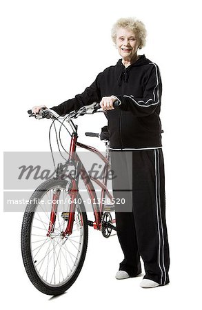 Older woman with a tandem bicycle