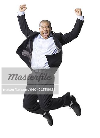Porträt eines Kaufmanns lächelnd und springen in der Luft