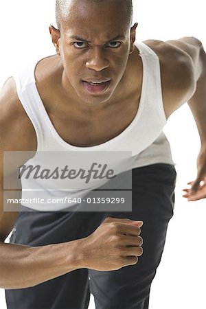 Close-up of a young man running