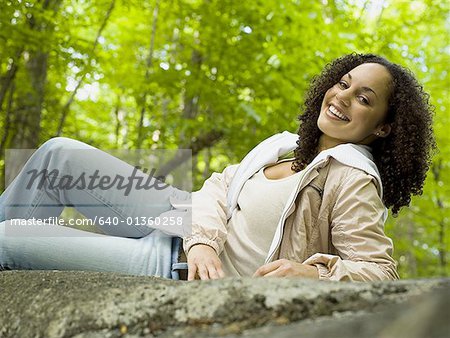 Portrait of a young woman lying down