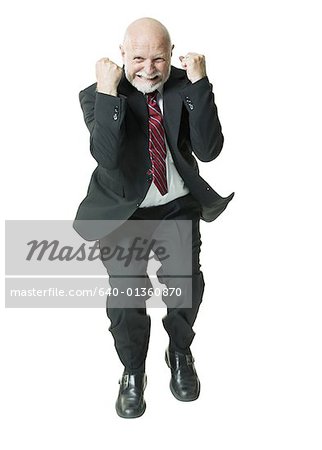 Portrait of a businessman clenching his fist