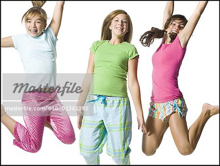 Three girls jumping