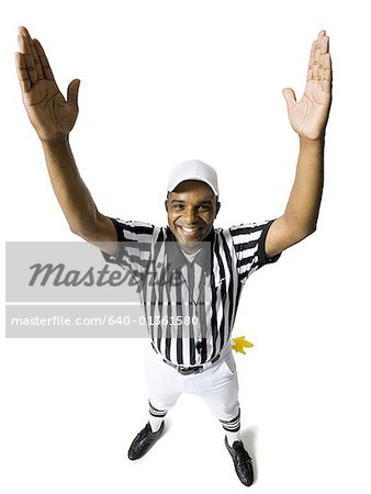 Referee touchdown signal smiling