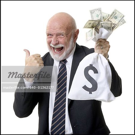 Portrait of a businessman holding dollar bills in a bag