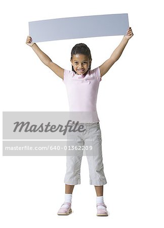 Portrait of a girl holding a blank sign