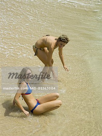 High angle view of two young women on the beach