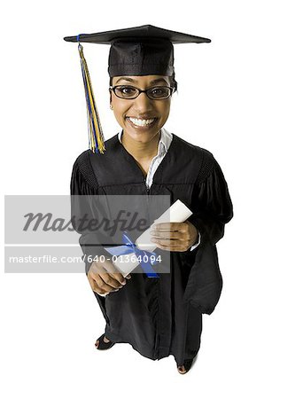 Woman in graduation gown and Blank Sign with diploma