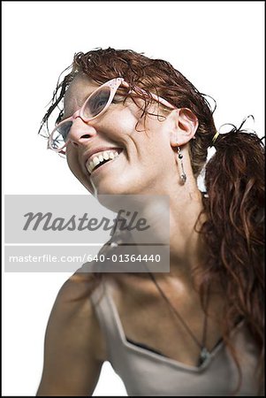 Low angle view of an adult woman laughing