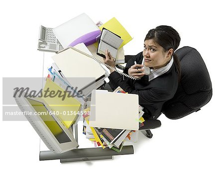 High Angle View of Multi-tasking-Kauffrau in einem Büro