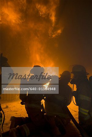 Firefighters putting out a fire