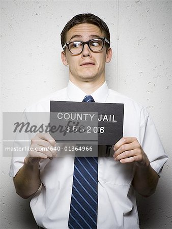 Mug shot de nerd à lunettes