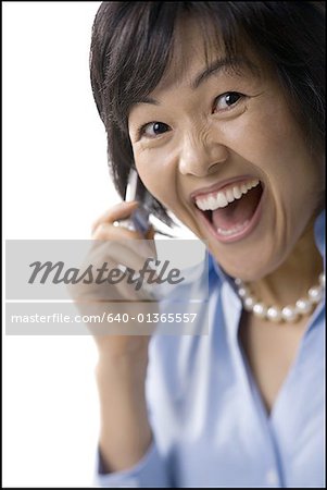 Portrait of a mid adult woman talking on a cell phone