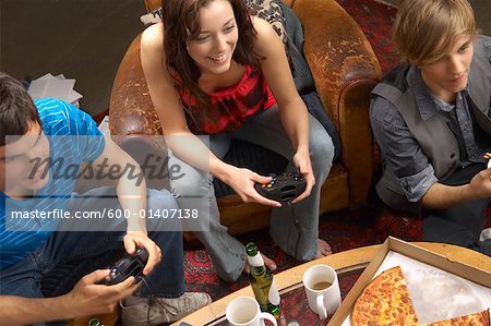 People in Lounge with Video Game