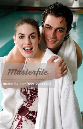 Young couple in a swimming pool at a spa