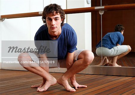 Young man stretching