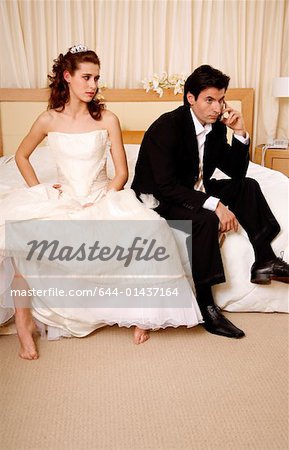 Bride waiting for groom to get off the phone