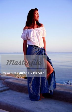 Woman posing on terrace with a view