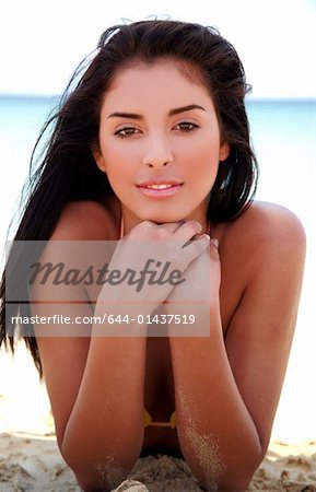 Closeup of young woman on beach