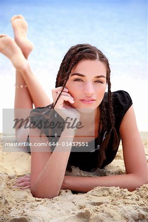 Closeup of young woman on beach
