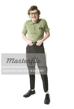 Male nerd with eyeglasses holding belt smiling