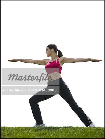 Profile of woman stretching outdoors