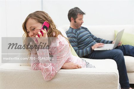 Father and Daughter on Sofa