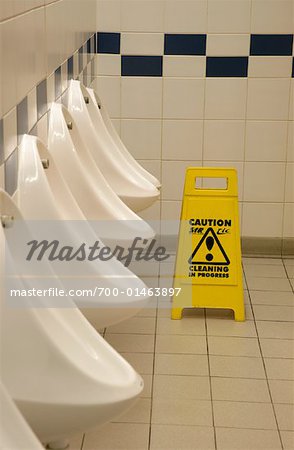 Cleaning Sign in Public Bathroom